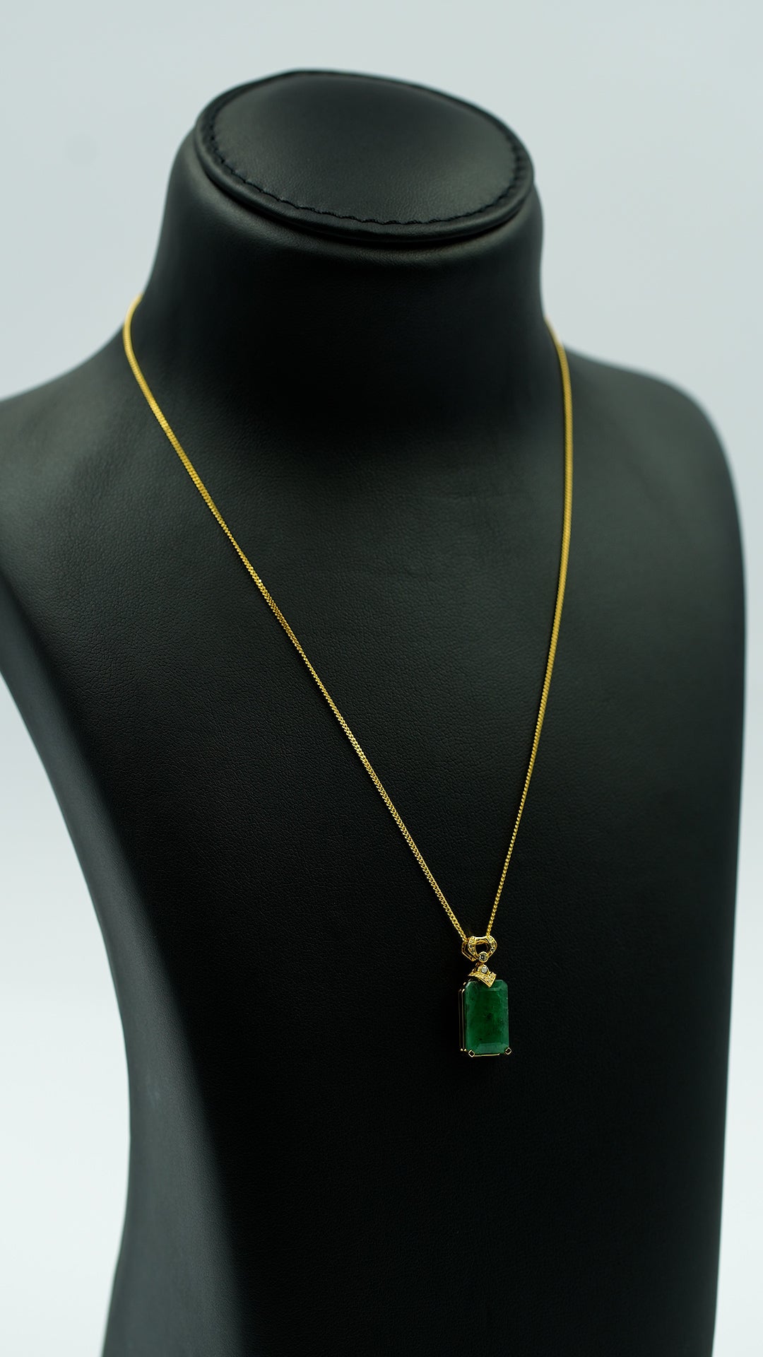 Gilded Emerald Elegance Pendant