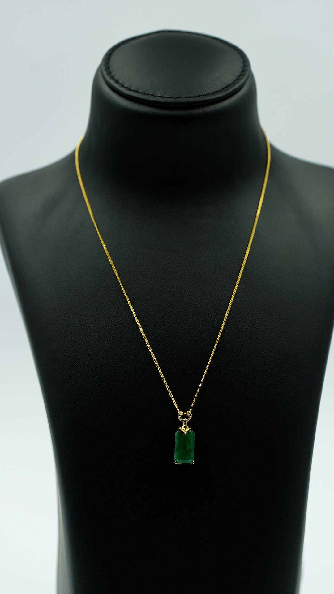 Gilded Emerald Elegance Pendant